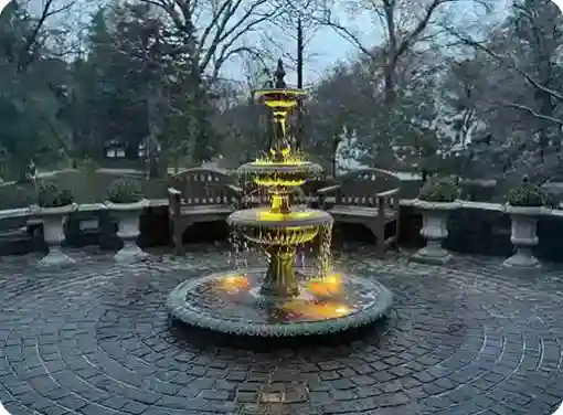 Fire and Water Bowls over flowing a pool wall